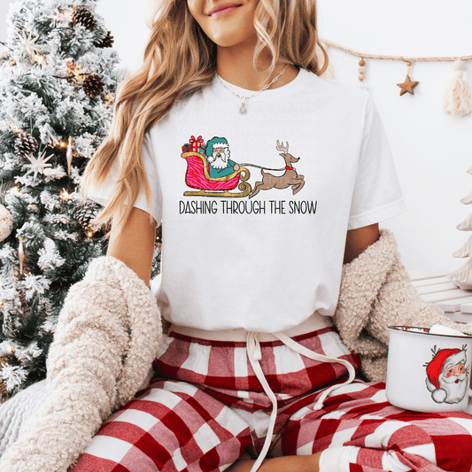 Dashing Through the Snow -Santa Wearing Green On Pink Sley DTF Transfer