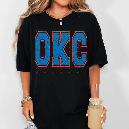 OKC Blue w/ Orange Outline Distressed DTF Transfer
