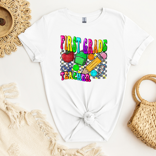 First Grade Teacher Multicolor Font/Grey Checkered DTF Transfer